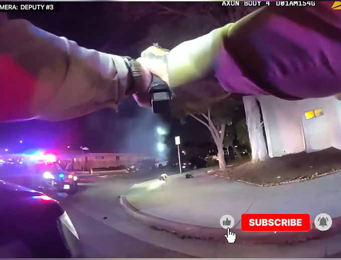 Police take down an armed man.