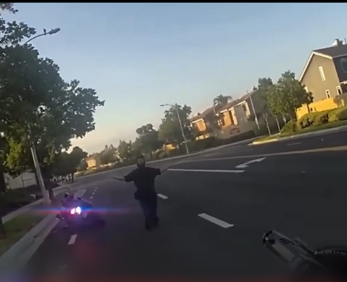 Officer Shoots Man After He Pulls Out a Large 