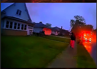 Tense Police Encounter Escalates Outside a Home