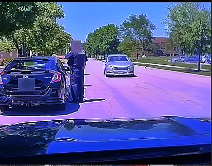 Axe-Wielding Man Rushes Officer During Traffic Stop