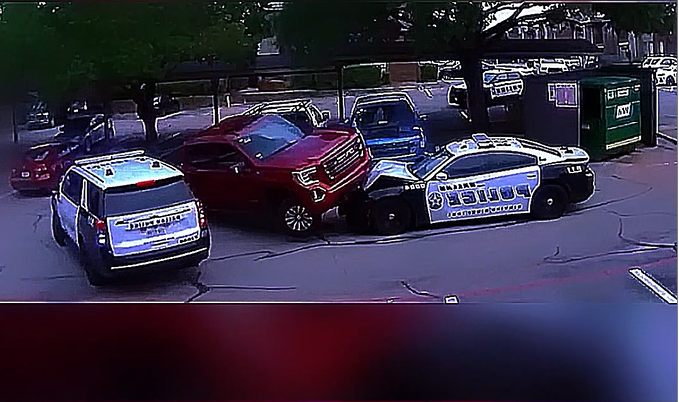 Bodycam Captures Police Shooting After Armed Suspect Crashes Into Cruisers