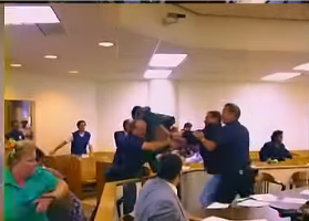 Man Who Shot Cop Suddenly Tries to Escape Court