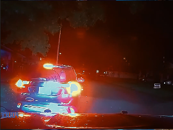 Officer Searches Vehicle During Tense Nighttime Stop