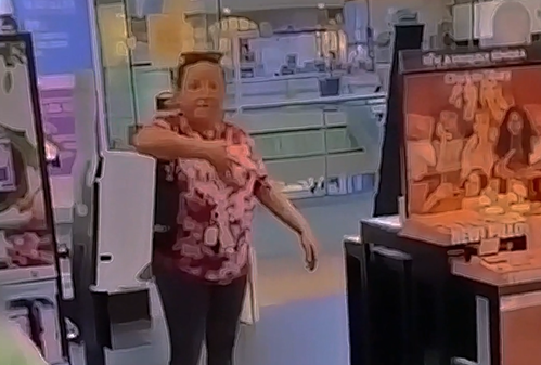 A woman was arrested by police inside a store in the plaza.
