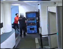 Suspect Overpowers Desk Officer Before Workers Jump In