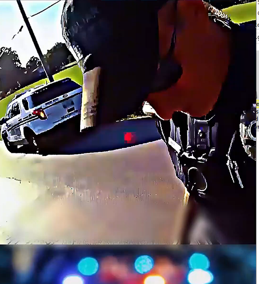 Police officer looks at his phone and knocks down a cyclist.