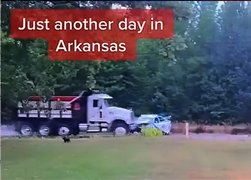 Stolen dump truck crashes into police car
