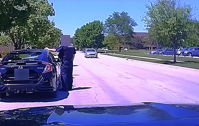 Hatchet-Wielding Man Charges Officer