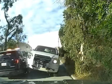 PARKING LOT TURNS INTO BATTLEFIELD AFTER SUSPECT CHARGES AT OFFICERS