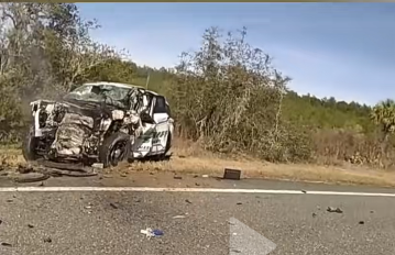WOMAN HIJACKS PATROL CAR, CRASHES INTO TRUCK KILLING 3 PEOPLE