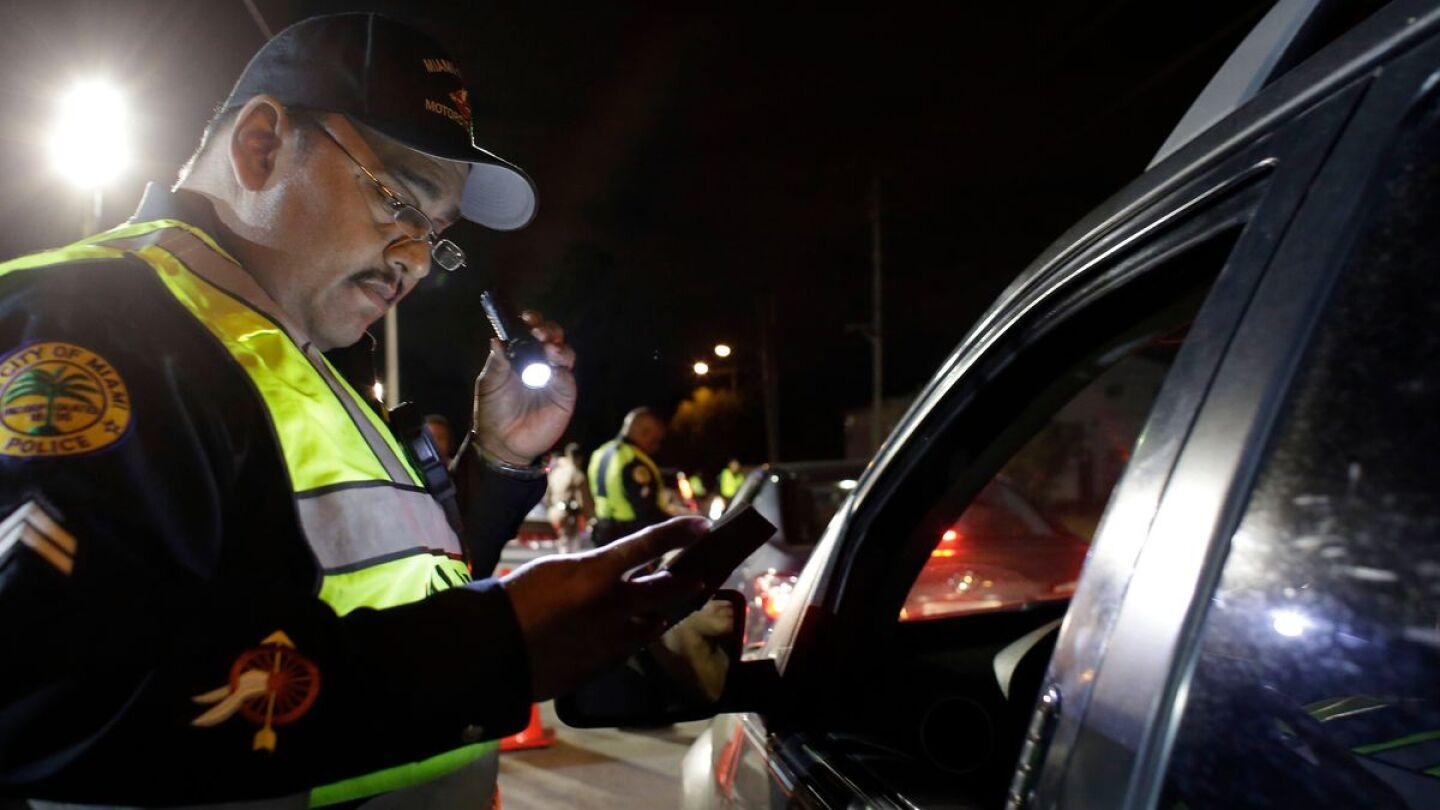 Drunk Woman Refuses to Get Out of Car as Police Move In