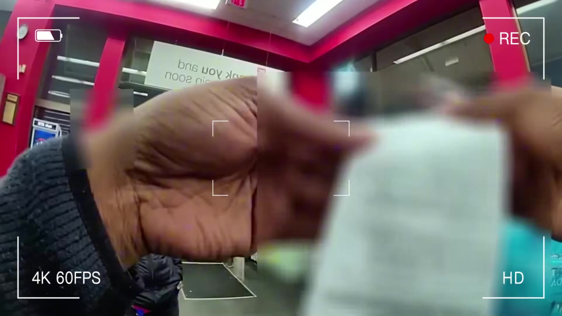 Real frame extracted from supplied shoplifting bodycam video