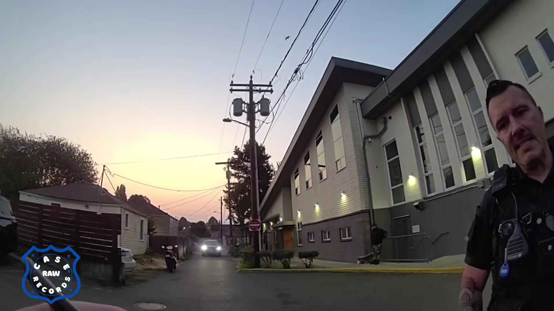 Real frame extracted from the supplied police bodycam video