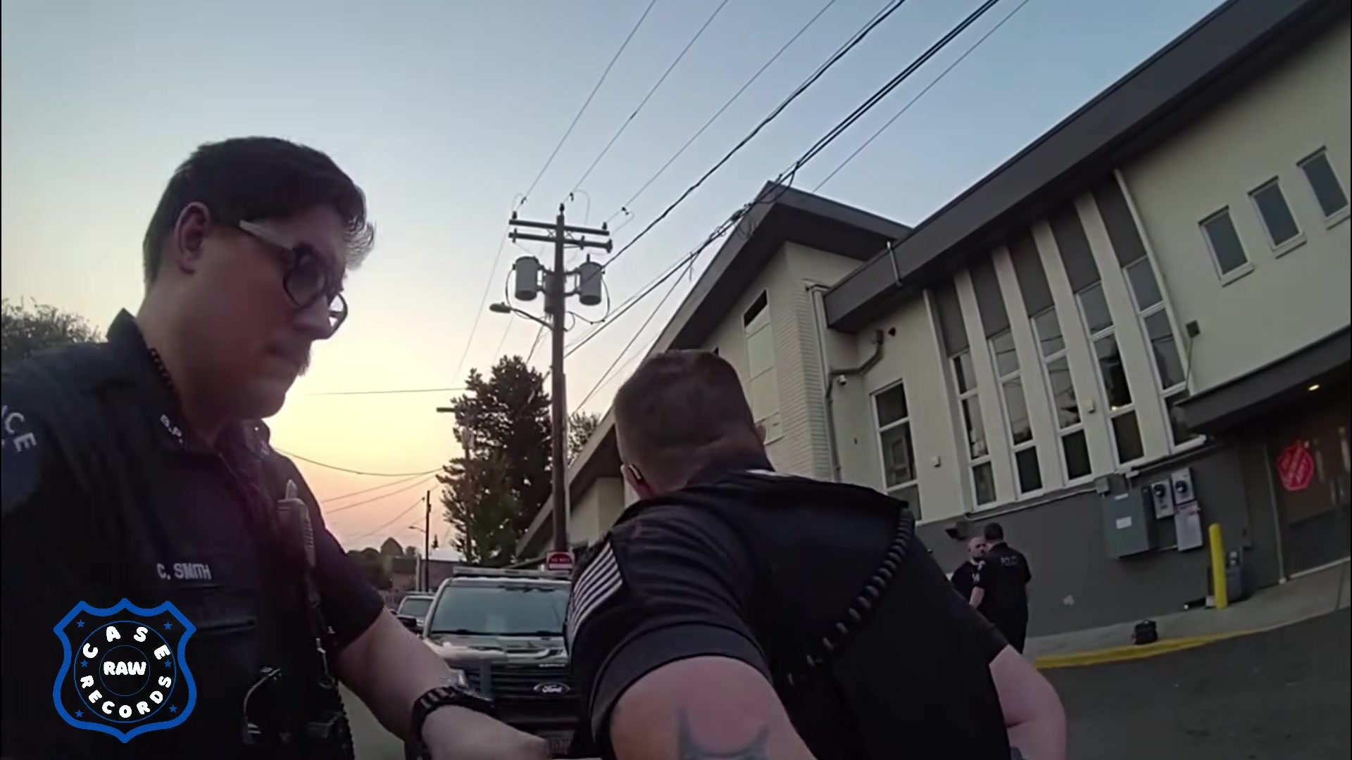 Real frame extracted from the supplied police bodycam video