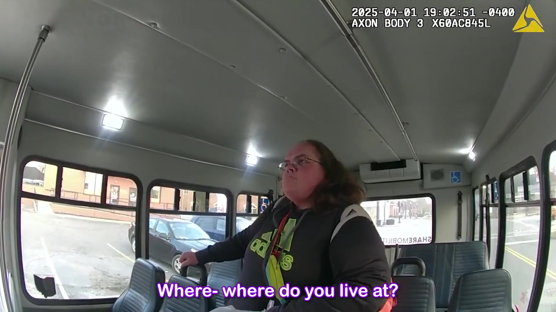 Real frame extracted from supplied bus disturbance bodycam footage