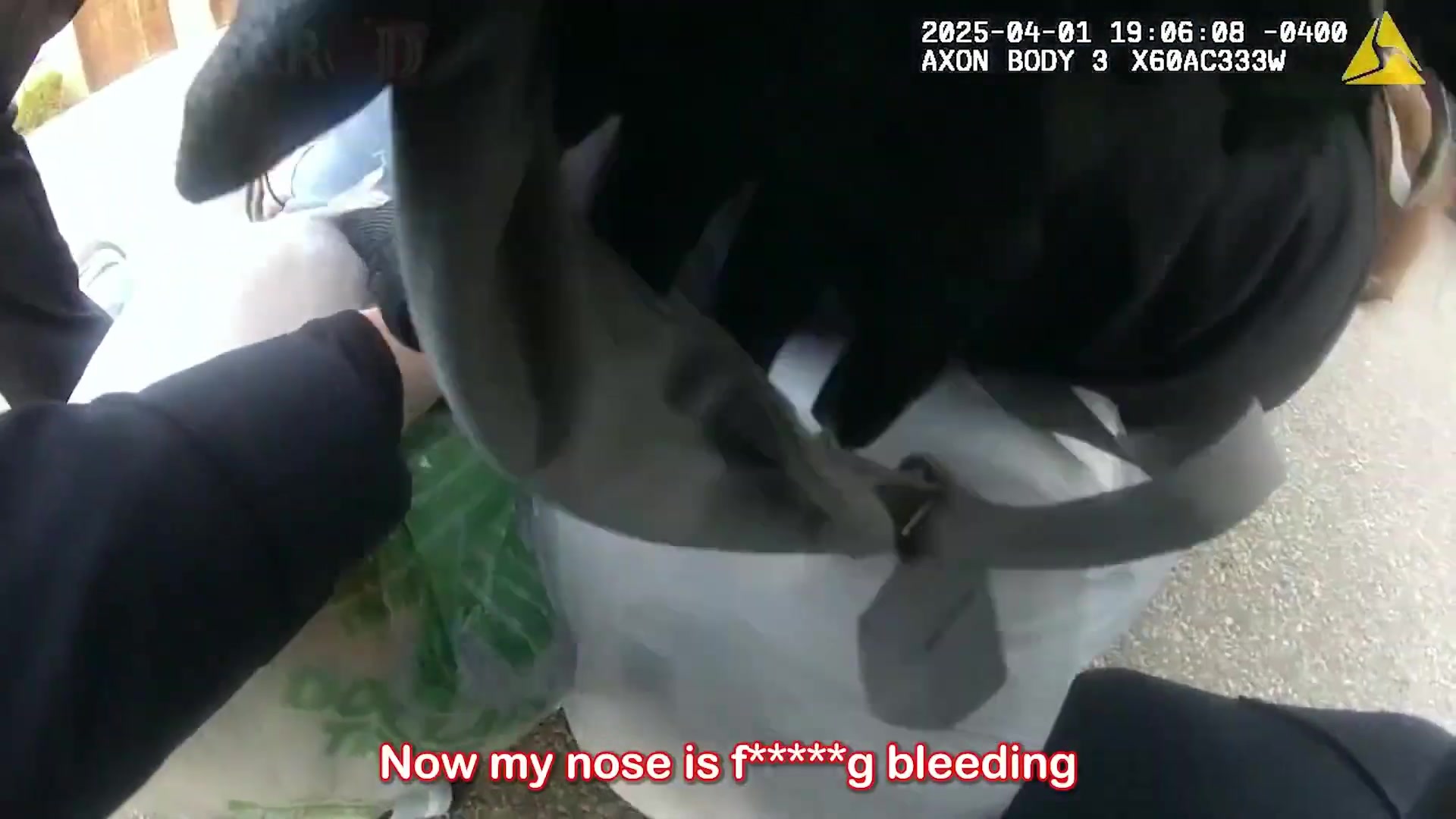 Real frame extracted from supplied bus disturbance bodycam footage