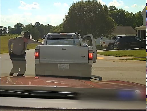 Dashcam Shows Trooper Shooting a Man Who Came Out Of His Car With a Gun in His Hand