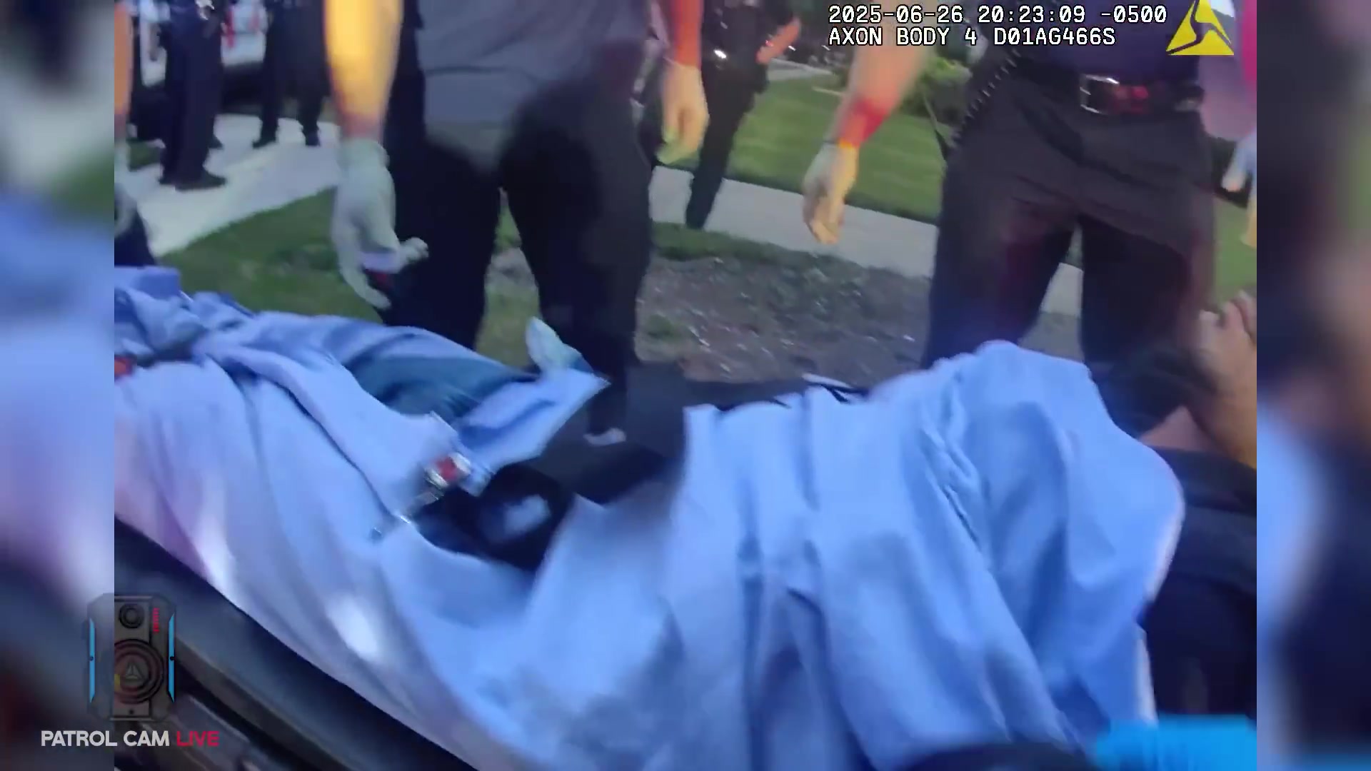 Real frame from the supplied body-camera video showing officers after the final arrest