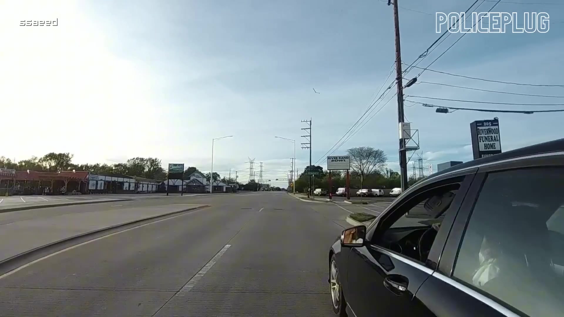 Real frame from the supplied traffic-stop footage