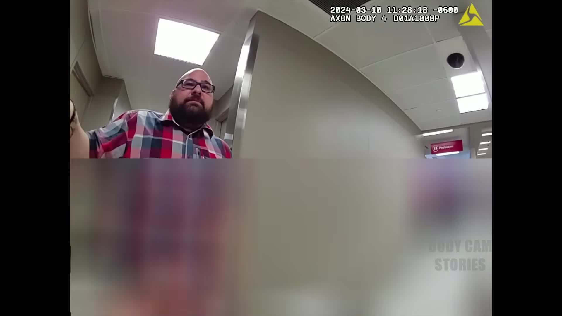 Horizontal frame from the supplied Albuquerque Police body-camera footage
