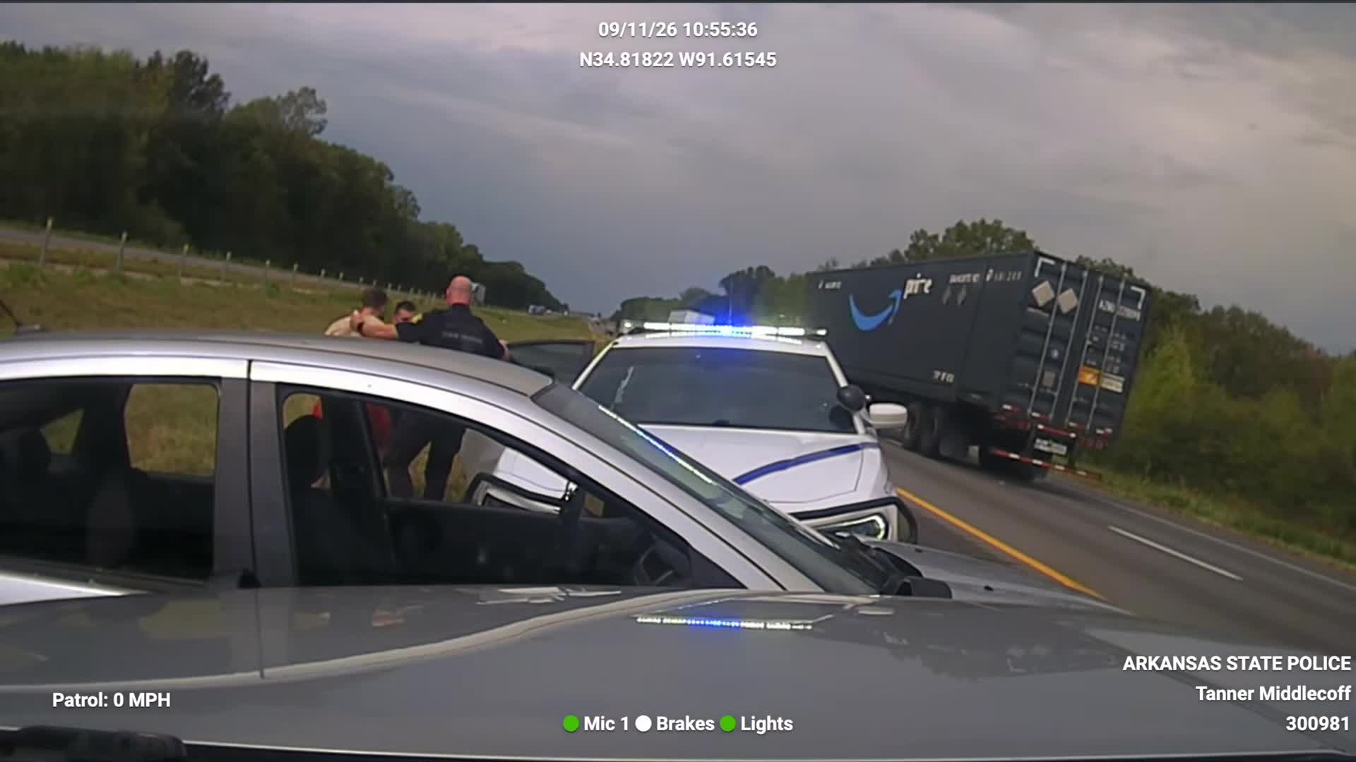 Real frame from the supplied Arkansas State Police pursuit footage near the end of the high-speed chase