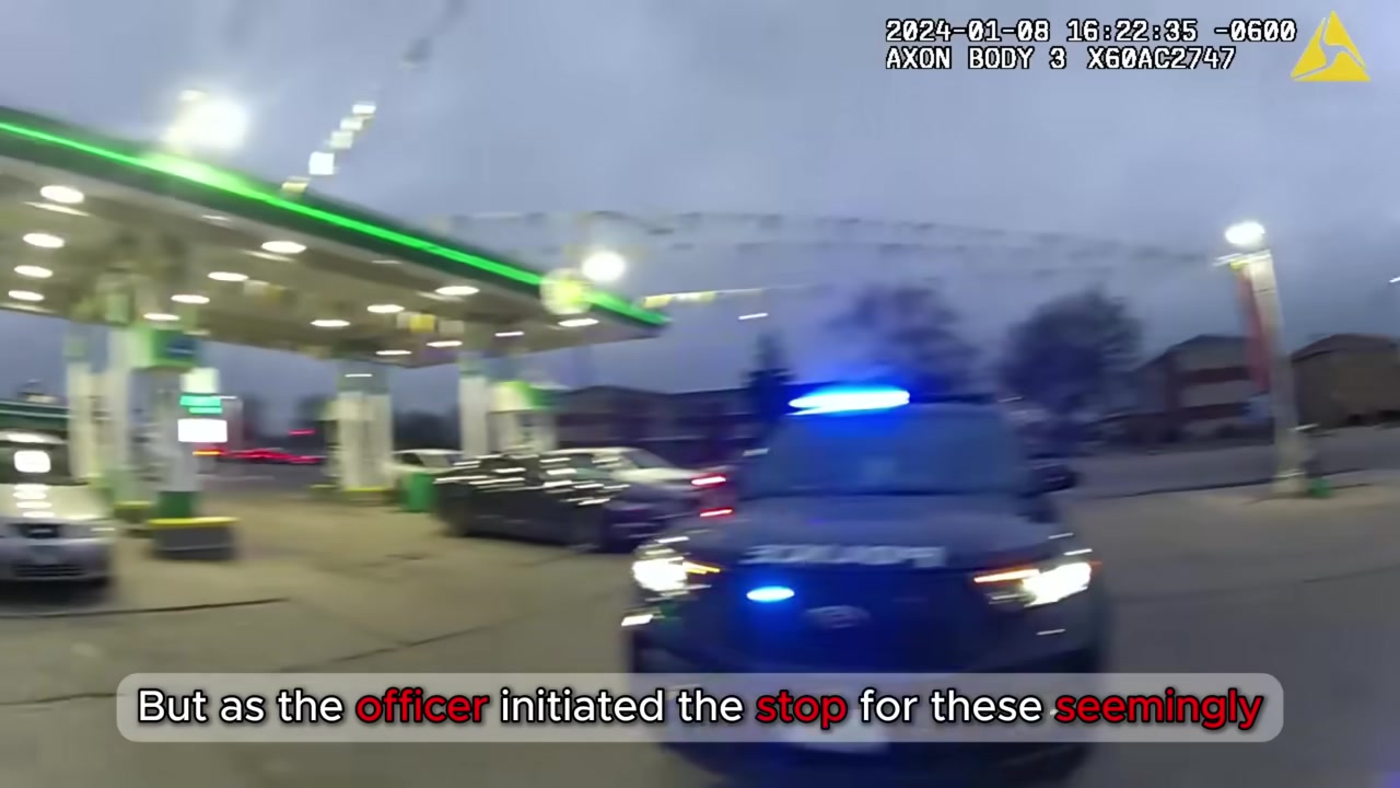 Real frame from the supplied police footage showing the traffic stop at the gas station