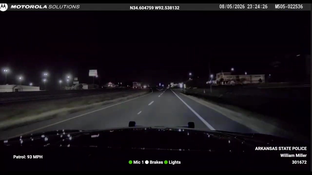 Real frame from the supplied Arkansas State Police dash-camera footage during the high-speed pursuit