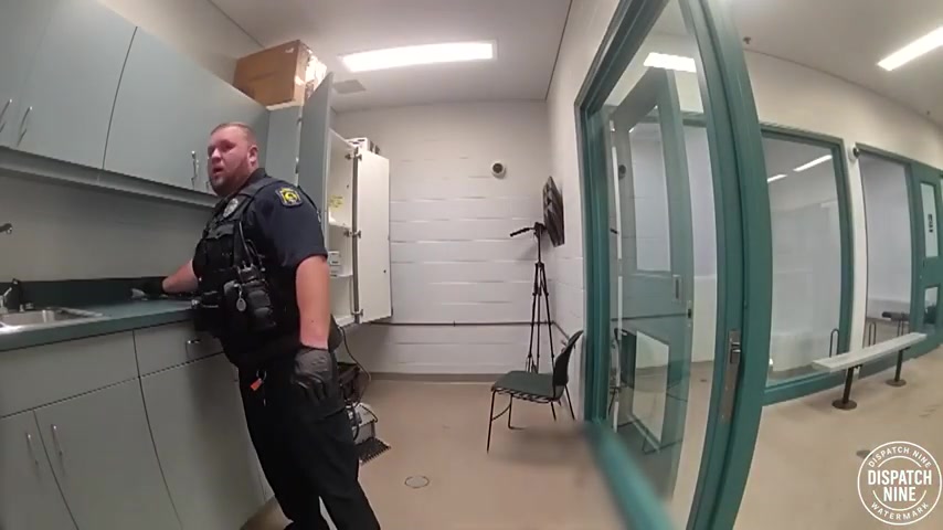 Real frame from the supplied footage showing the later stage of Shanna McRee's custody after the use-of-force incident