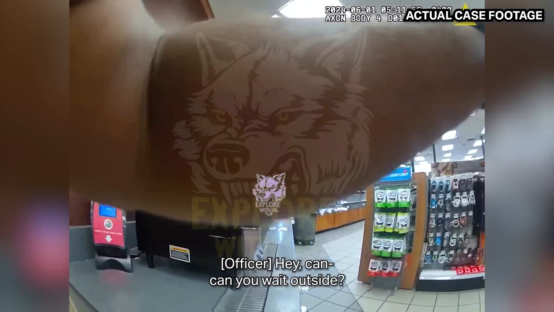 Frame from supplied police footage showing the interior of the RaceTrac during the response