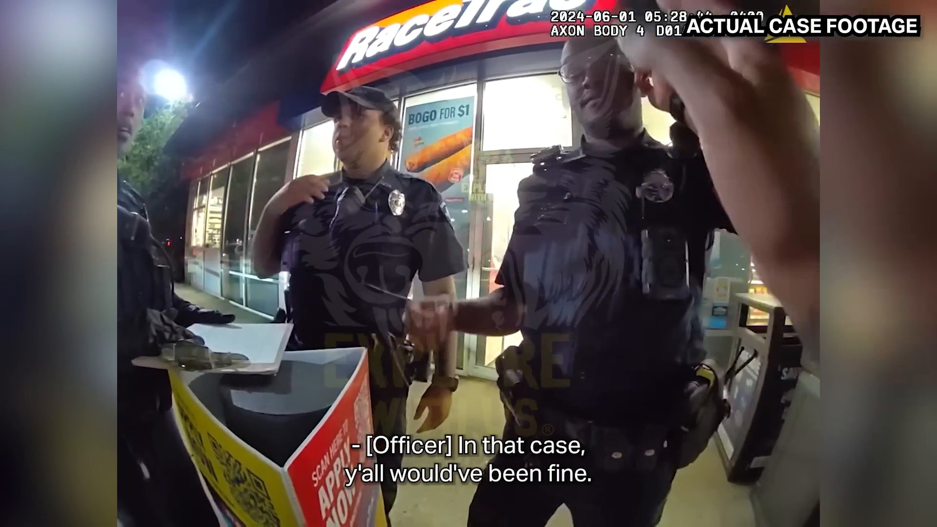 Frame from supplied footage showing officers discussing the incident after the arrest