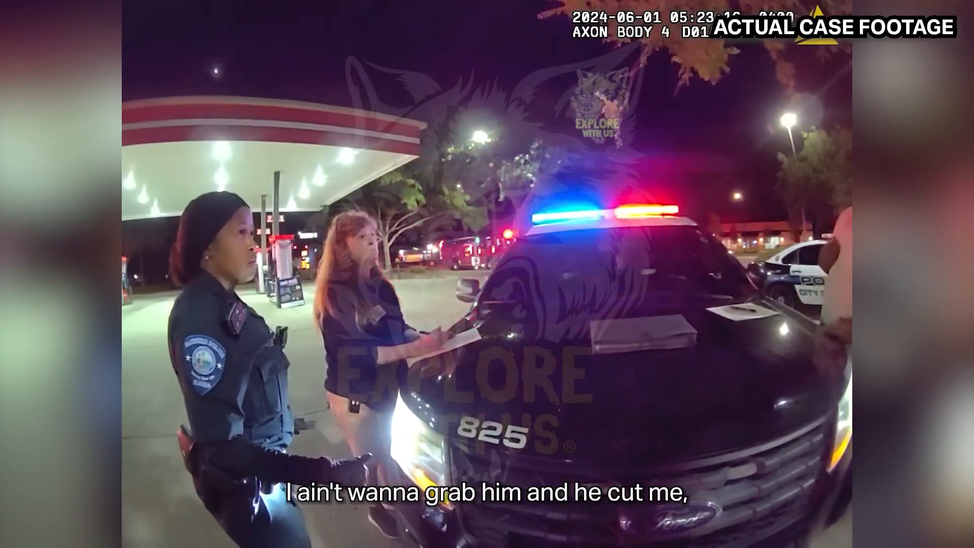 Frame from supplied footage showing Sanford officers outside the RaceTrac after the arrest