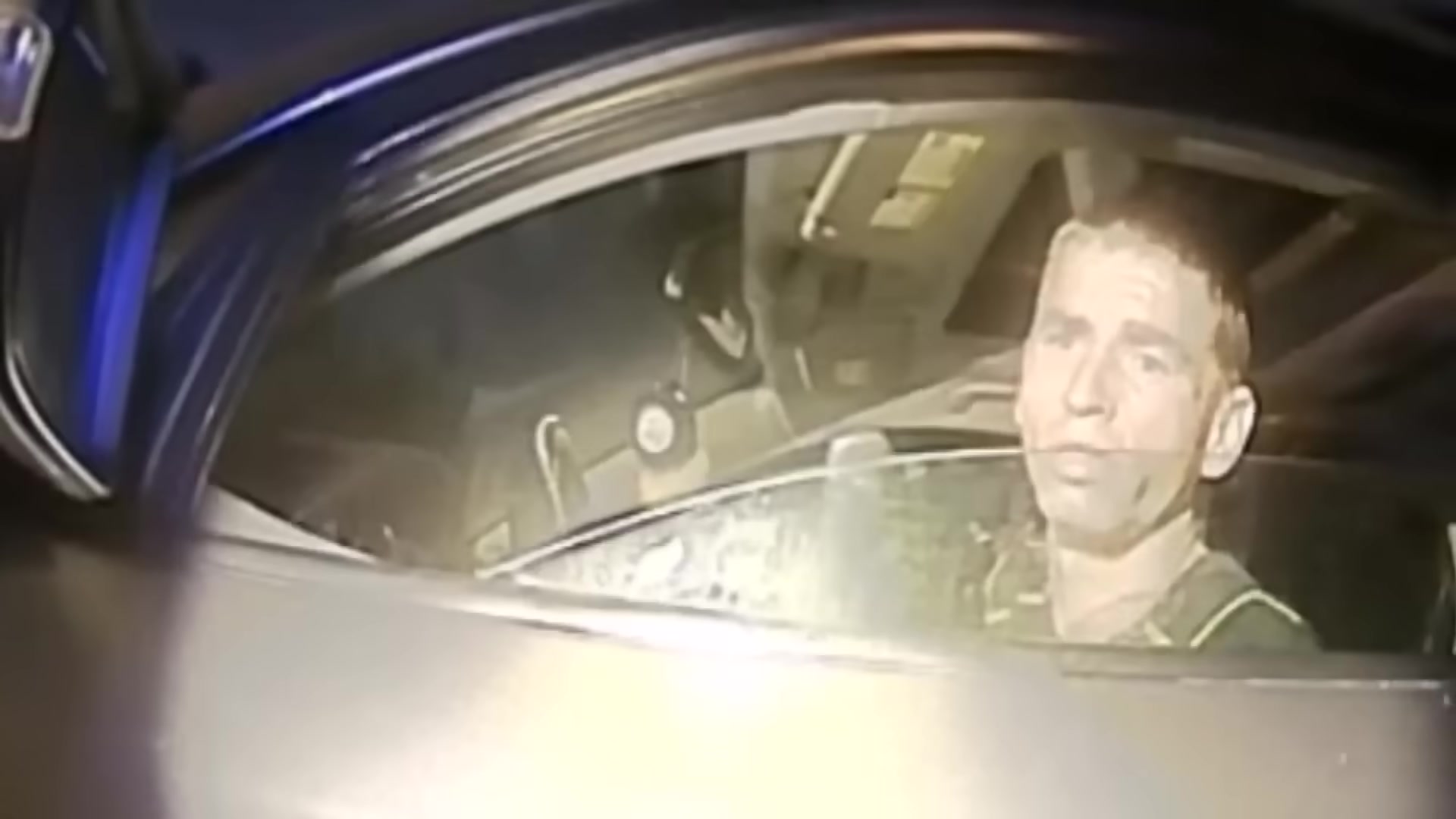Real frame from the supplied footage showing Kenneth Martell inside the Kia during Officer Brianna Tedesco's July 2018 encounter