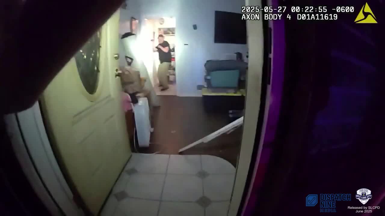 Salt Lake City police bodycam frame as officers enter the residence during the May 27, 2025 incident