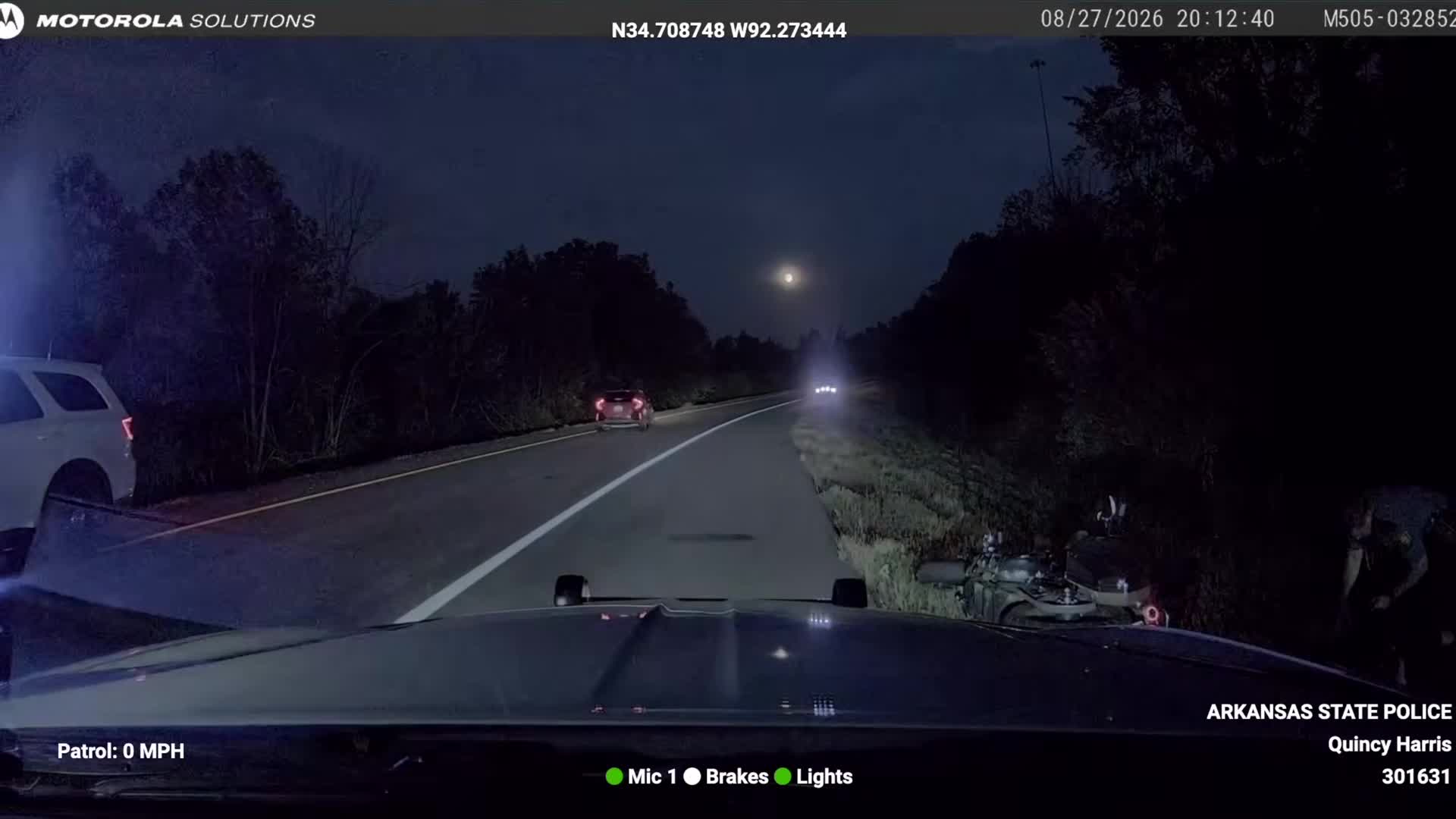 Motorcycle down beside the road at the end of the Arkansas State Police pursuit