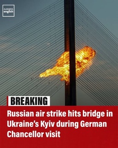 Russian Drone Strikes Kyiv Bridge as German Chancellor Arrives in Ukraine