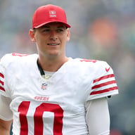 49ers Make Latest Move Regarding Mac Jones’ Future as GM John Lynch Receives More Than 3 Calls and $30 Million Trade Requests
