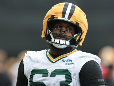Beloved Packers LT Joins Panthers After Failed Contract Negotiations - Sends Farewell to Green Bay Fans After 4 Years of Commitment